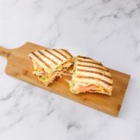 Chicken Club Panini · Grilled chicken, Swiss cheese, bacon, lettuce and tomato.