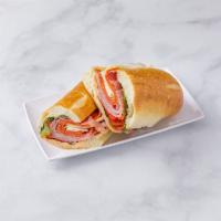 3. Italian Sub · Prosciutto, cappy ham, imported provolone, Genoa salami and roasted pepper on French baguette.