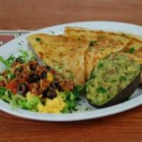 Quesadilla · Flour tortillas stuffed with cheese, baked, then pan-seared in bacon butter to a golden brow...