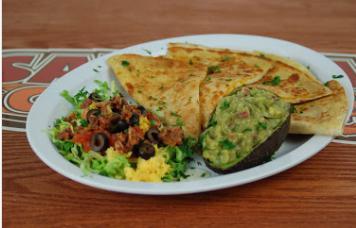 Quesadilla · Flour tortillas stuffed with cheese, baked, then pan-seared in bacon butter to a golden brown. Lettuce, pico de gallo, bacon bits, black olives, and sour cream served on the side.