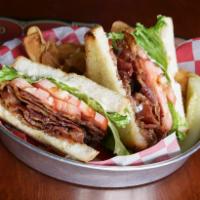 B2LT Sandwich · A heaping amount of smoked Applewood bacon and sweet peppered bacon on Texas toast with lett...
