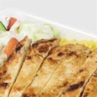 Grilled Chicken with rice and salad · With rice and salad.