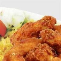 6 Piece Hot Wings with rice and salad · With rice and salad.