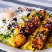Chicken Kebab Plate · 2 chicken kebab skewers served with a bed of basmati rice and Greek salad.