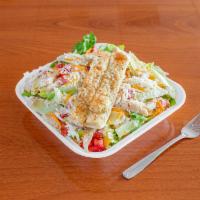 Chicken Caesar Salad · Grilled chicken, Parmesan, artichoke hearts, tomatoes and cheese. Made with fresh romaine le...