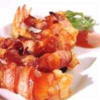 San Jose · Shrimps wrapped with bacon and staffed with cheese, serrano peppers served with rice and sal...
