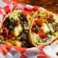 Na-cho Burrito · Loaded with ground beef, grilled peppers, lettuce, pico, jalapenos, tortilla strips, sour cr...