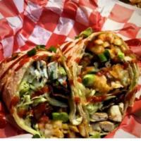 Spicy Chicks Burrito · Made with grilled chicken, bacon, pepper Jack, lettuce, tomato, onion, chopped jalapenos, Ca...