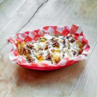 The Say Cheese Fries · Ranch seasoned steak fries layered with white cheddar and queso cheese, crispy bacon bits wi...