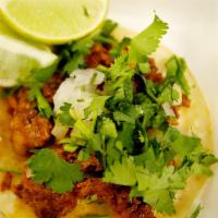 Tacos · Street taco tortilla grilled to perfection, filled with your choice of our various meats top...