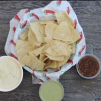 Cheese Dip · Our special made, creamy cheese sauce served with our fresh chips made daily.
