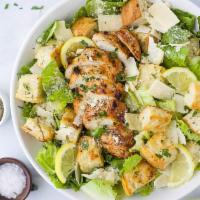 S4. Grilled Chicken Caesar Salad · Romaine lettuce, grilled chicken, Parmesan cheese, tomato, croutons, and choice of dressing.