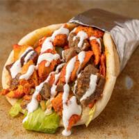 Mix gyro  · Lamb , halal chicken , lettuce, tomates ,cucumber, white & hot sauce 
