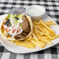 Chicken Gyro Sandwich · Chicken gryos wrapped in warm pita bread with onions, tomatoes, lettuce, black olives, and f...