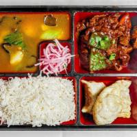1. Tibetan Thali · Vegetable, beef, and chicken. Rice, 3 pieces momo, chilly dry (chicken, beef, or veg) and po...