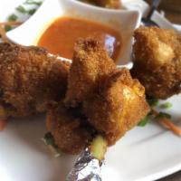 2. Chicken Lo Lolipop · Chicken wings made with lolipop battered deep fry.
