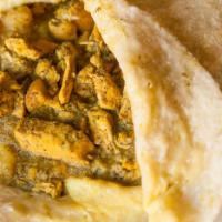 Boneless Curry Chicken Roti · 