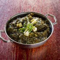 Palak · Gluten-free. Fresh spinach cooked with cumin, ginger, turmeric, and all-spice.