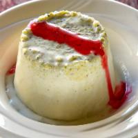 Pista Badam Kulfi · Pistachio and almond ice cream made with milk and cardamom. Topped with rose syrup.