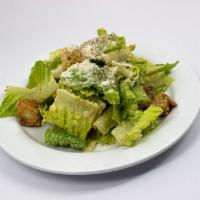 Classic Caesar Salad · Crisp romaine leaves, Parmesan cheese, croutons, garlic-lemon-anchovy vinaigrette.