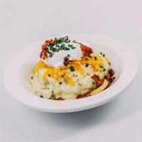 Loaded Mashed Potatoes · Yukon Gold Mashed Potatoes, with Tillamook Cheddar, smoked bacon, sour cream, chives.
