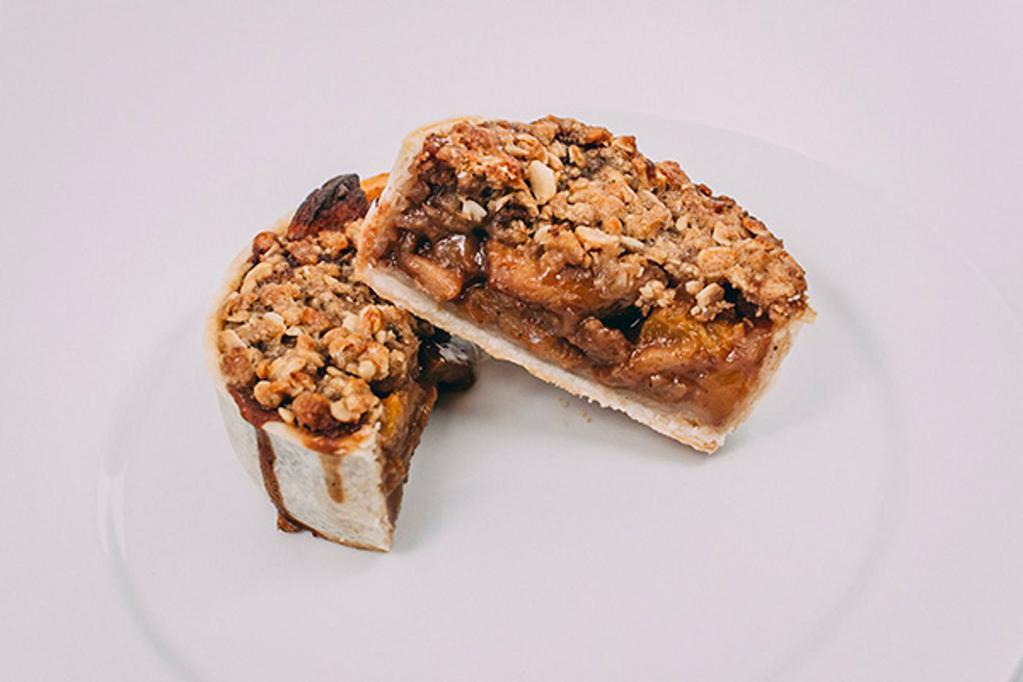 Apple Peach Cobbler · Filled with brown sugar spiced apples and peaches, streusel oat topping.