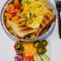 Mexican Omelette · Cheddar, jalapenos, avocado, onions, green peppers and tomato. With home fries or hash brown...