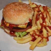 Cheeseburger Deluxe · All burgers include lettuce, and tomatoes with French fries.