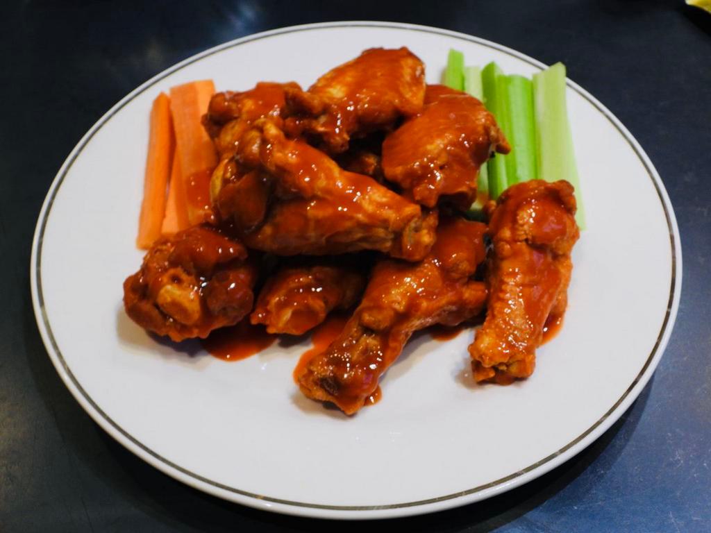 Buffalo Wings · 5 Wings marinated and mixed with the chosen sauce