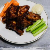 Barbecue wings  · 5 pieces of fried  BBq wings Served with glazed barbecue sauce