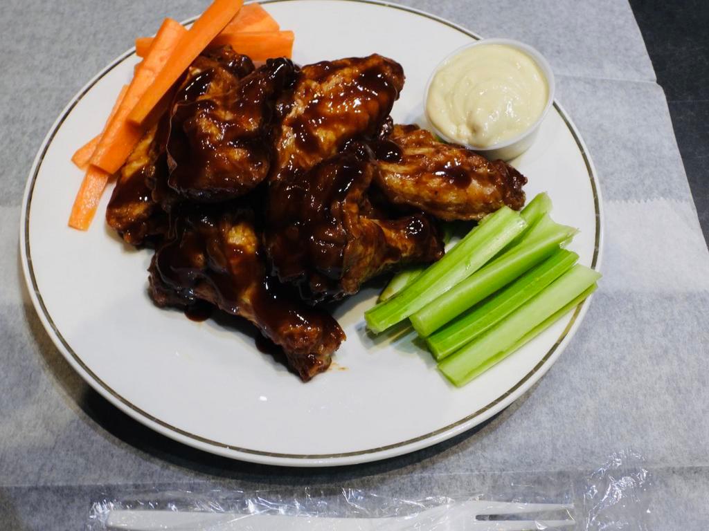 Barbecue wings  · 5 pieces of fried  BBq wings Served with glazed barbecue sauce