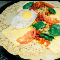Egg, Fresh Tomato and Melted Cheese Crepe · With sauteed spinach.