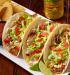 Fish Tacos   · Crisply fried in LandShark batter wrapped in a grilled flour tortilla and layered with grill...