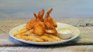 Crispy Coconut Shrimp  · Jumbo shrimp crusted with coconut, fried and served with coconut ranch and french fries.  