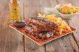BBQ Ribs  · Pork tender baby back ribs seasoned and basted with signature BBQ sauce served with french f...