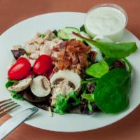 California Salad · Turkey, crispy bacon, spinach, romaine lettuce, mushrooms, cherry tomatoes, cucumbers and eg...