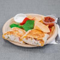 Grilled Chicken Quesadilla · Filled with pico de gallo and melted mixed cheese. Served with salsa and sour cream.