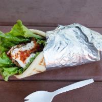 Lamb Beef  Gyro Wrap · Served on a toasted naan with spring mix, our signature tzatziki and spicy sauce.