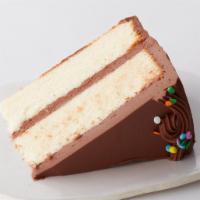 Van/Choc Cake Slice to go · Our Vanilla Cake topped with Chocolate Buttercream.

Sprinkles chosen by the bakery.