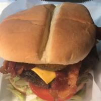 '52 Chevy Burger · 8 oz. Angus beef with lettuce, tomato, fried dill pickles, bacon, American cheese and BBQ sa...