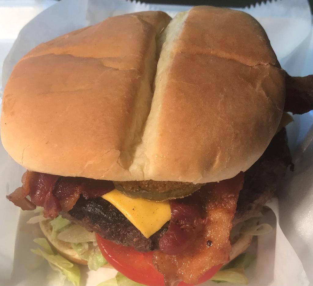 '52 Chevy Burger · 8 oz. Angus beef with lettuce, tomato, fried dill pickles, bacon, American cheese and BBQ sauce.