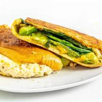 Ultimate Wich Sandwich · Hot pressed on focaccia with scrambled eggs, cheddar cheese, green onions, avocado and spina...