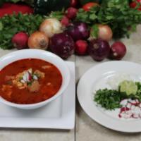Menudo · Beef tripe soup. Spicy soup with beef tripe and hominy corn. Garnish with jalapeno, onion an...