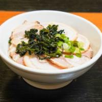 Pork Udon · Udon Noodle, Chashu Pork 9pcs, Green Onion,
Sesame seeds, Tonkotsu Soup