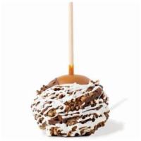 Specialty Caramel Apple · We take a large, crisp Granny Smith apple, dip it in thick, gooey caramel, then roll it in f...
