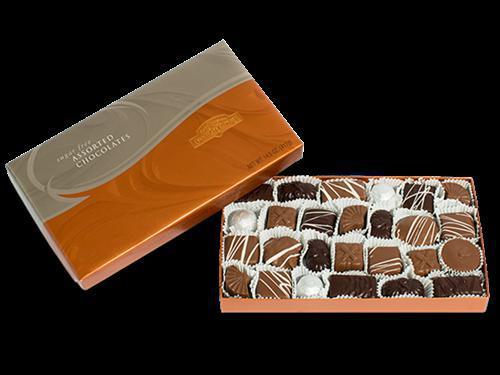 Sugar-Free Assorted Chocolates · Sugar Free? So sweet, so natural, you'll hardly notice the difference! Features a single layer of nutty clusters, melt-in-your-mouth chewy caramels, molded chocolates and meltaways in milk, dark and white chocolate. Certified Kosher (OU).