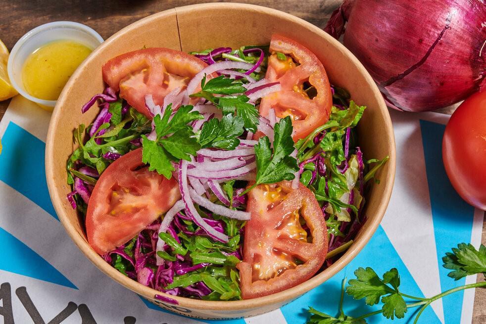House Salad · Arugula, lettuce, cabbage, red onion, tomatoes, parsley and lemon vinaigrette