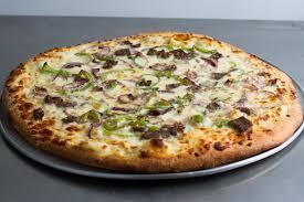 Steak and Cheese Pizza · Steak, fresh mushrooms, green peppers and red onions topped with a three cheese blend.