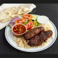 halal  beef kabab · served with halal ground beef, fresh rice,salad & our secret white sauce ,marinated and cook...
