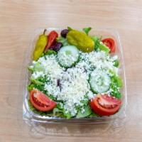 Garden Salad · Romaine lettuce, Roma tomatoes, red onions, cucumbers, green peppers, Greek kalamata black o...